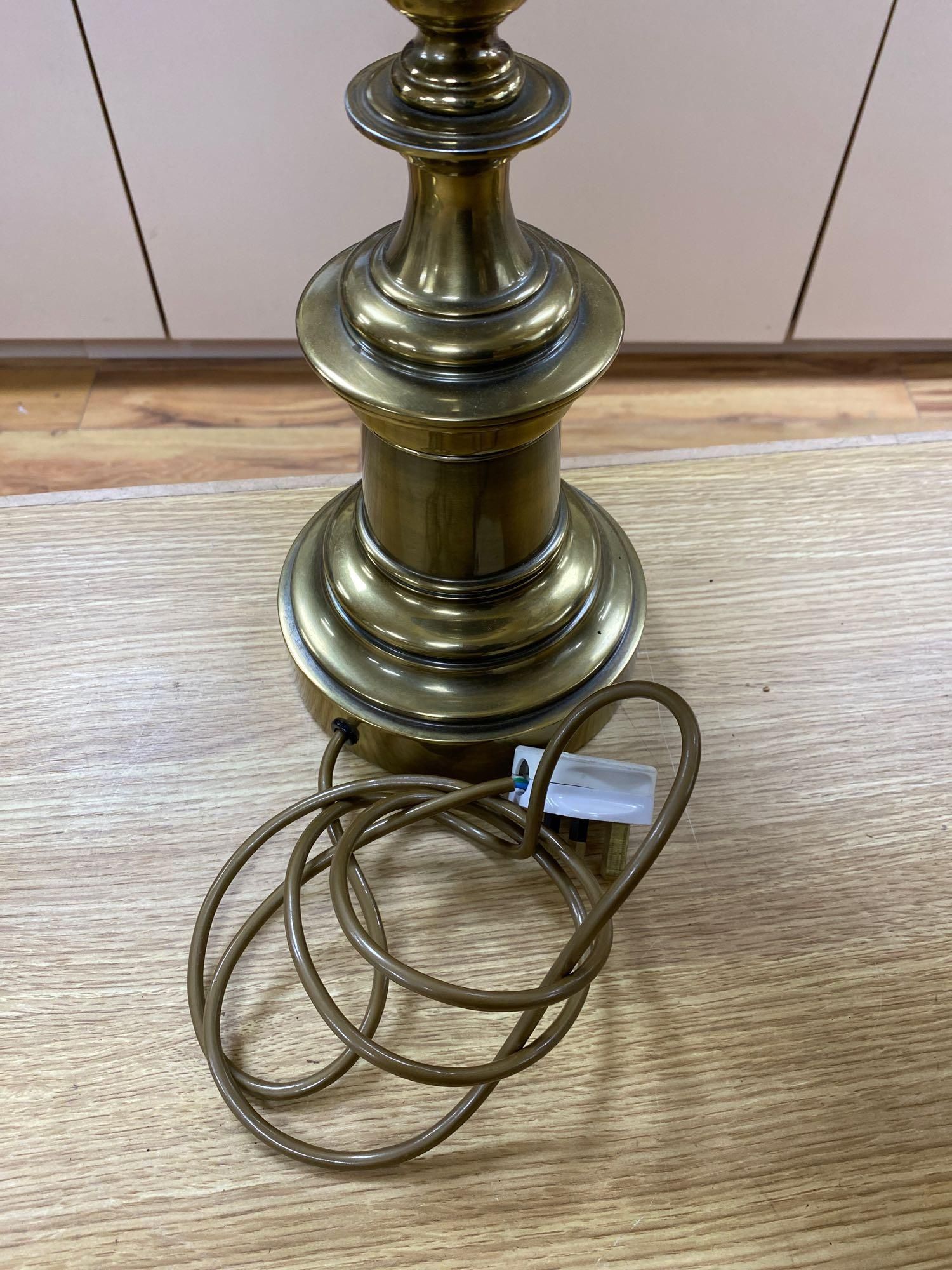 A pair of Art Nouveau style brass lamps, total height 67cm